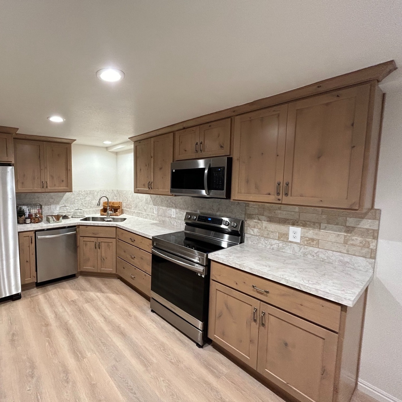 Finished basement with custom kitchenette
